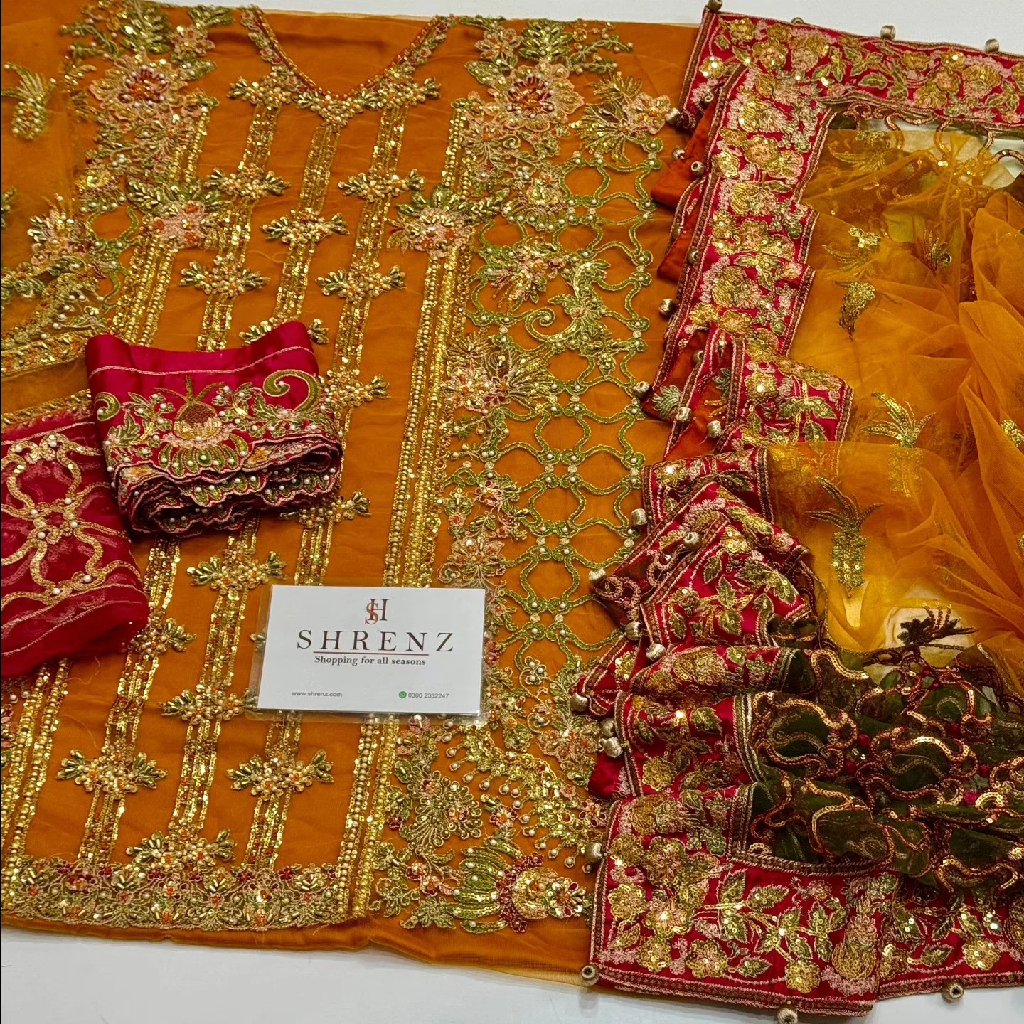 Shrenz Orange Bridal Collection Net Gharara Replica - Image 3